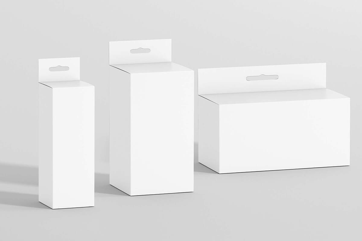 drei unbedruckte und unterschiedlich große Aufhängeschachteln