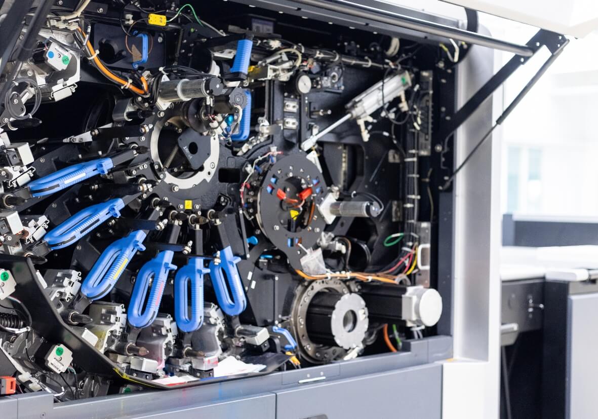 Digitaldruckmaschine mit Hexachrome Digitaldruckmaschine mit Hexachrome