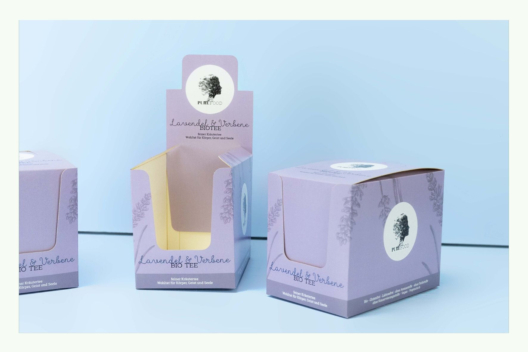 Several pink cardboard counter displays, one of them open Several pink cardboard counter displays, one of them open